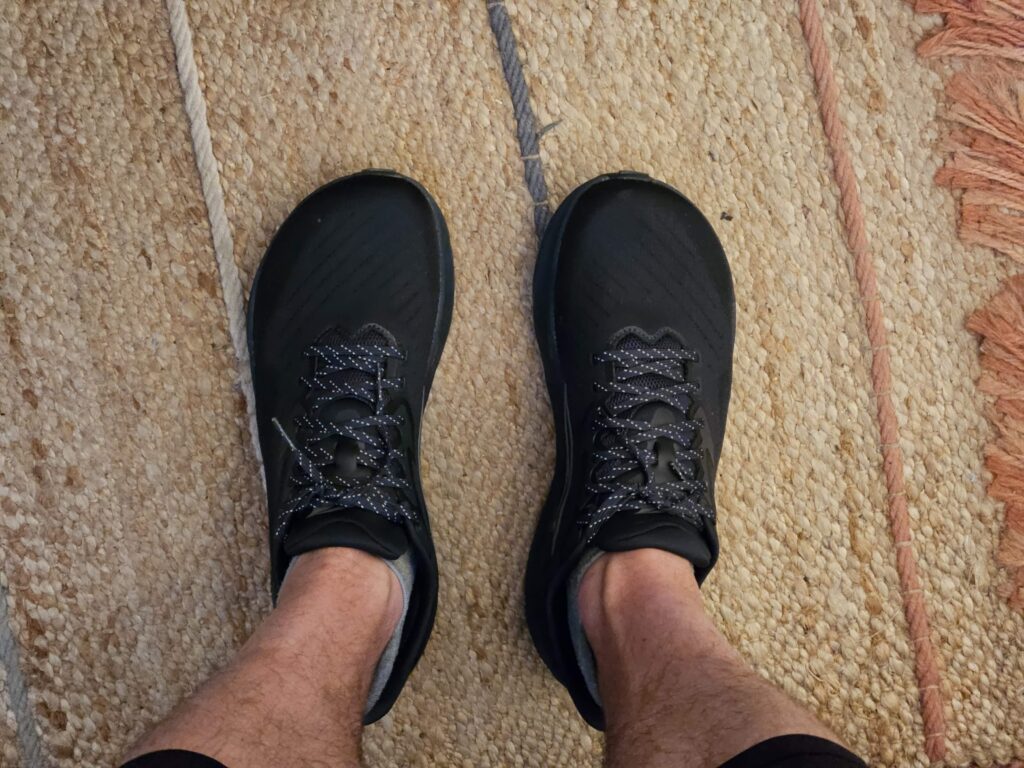 Pair of black Altra Experience Flow running shoes
