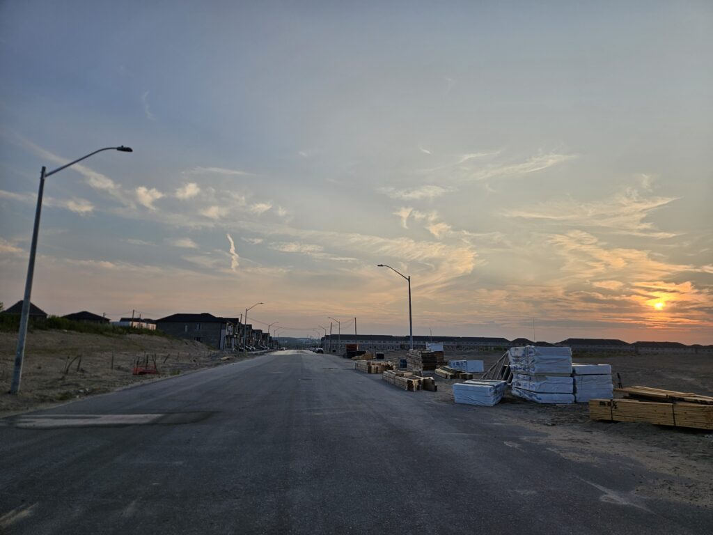 sunset of a new and unfinished urban development